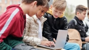 Students using laptop How AI Helps Students: Asheville Schools Use ChatGPT