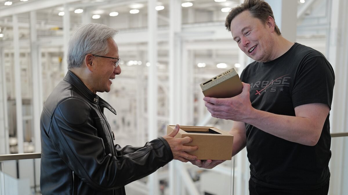 NVIDIA CEO Jensen Huang delivering NVIDIA DGX Spark to Elon Musk